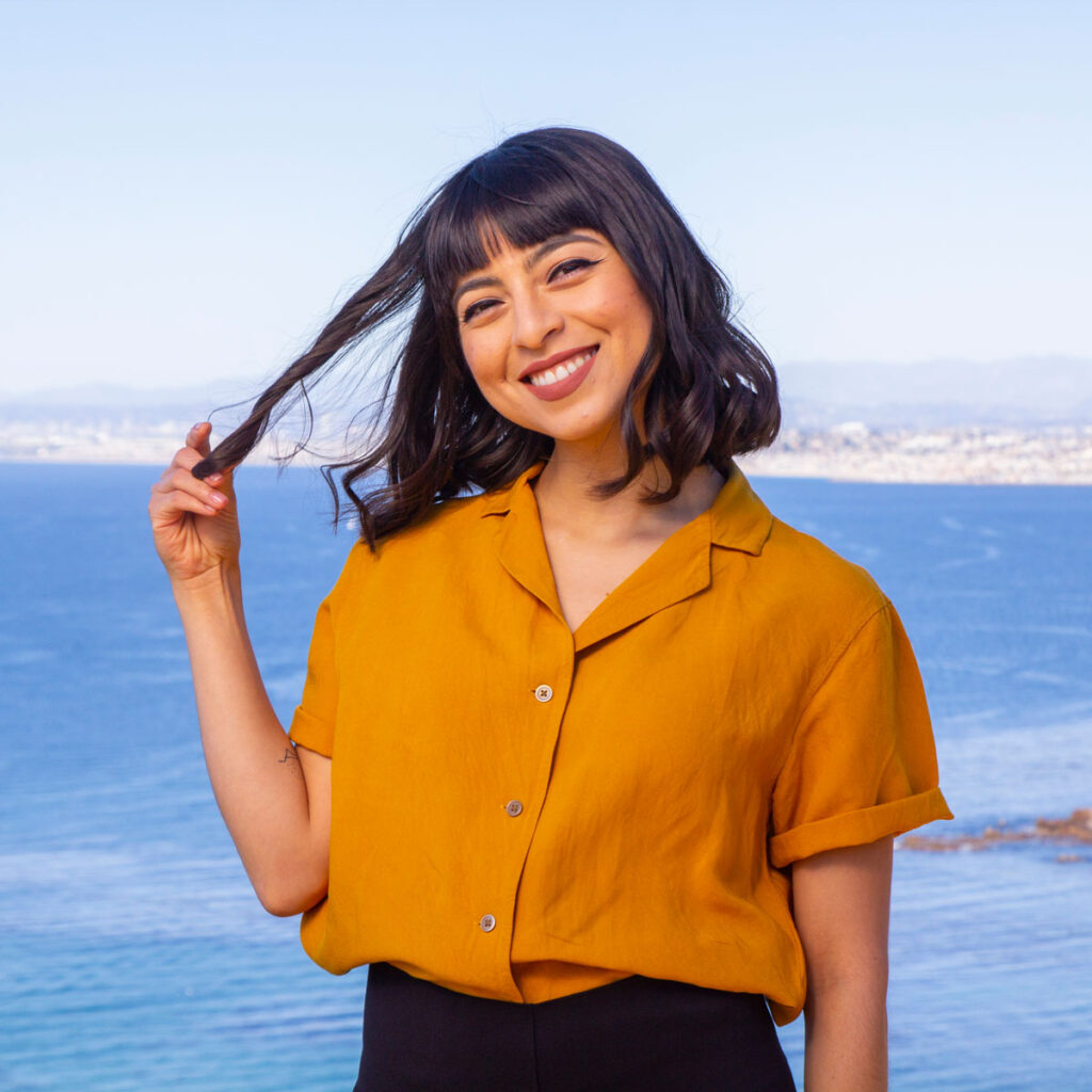 Little Sol sister smiling in front of the cliff-view in Palos Verdes Peninsula.